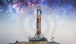Spaceship on launch pad. Mission to Moon. Return to Moon. SLS space rocket. Orion spacecraft.