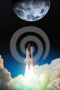 Spaceship lift off. Space shuttle with smoke and blast takes off into space on a background of sunset with a full moon.