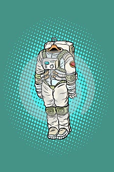 Spacesuit astronaut hanging on a hanger photo