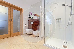 Spacious bathroom with doors