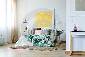 Spacious bedroom with artworks photo