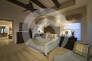 Spacious Bedroom With Beamed Ceiling At Home