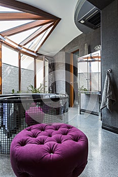 Spacious black villa bathroom with jacuzzi