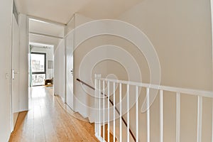 A spacious bright corridor with the stairs