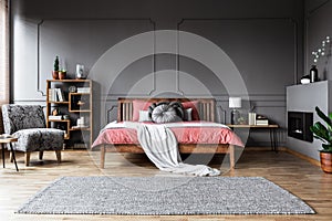 Spacious grey and pink bedroom