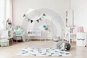 Spacious kid`s room with banner