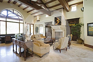 Spacious Living Room With Beamed Ceiling