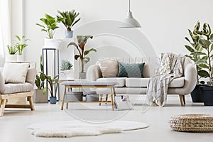 Spacious living room with bench photo