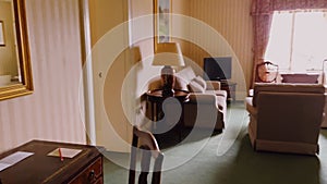 Spacious luxury bedroom in an English countryside hotel, complete with plush bedding and elegant decor