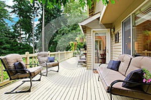 Spacious walkout deck with sitting area