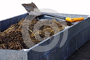 Spade raised garden bed