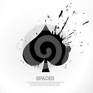 Spades symbol with ink splatter photo