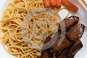 Spagetti Pasta with meat carrots plate