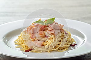 Spaghetti aglio e olio, pasta with chili and garlic and bacon