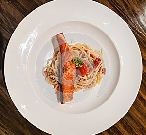 Spaghetti aglio olio with delicious salmon meat