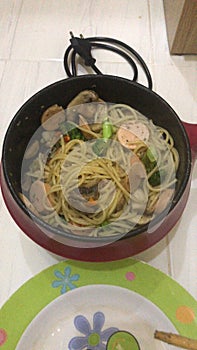 Spaghetti aglio olio with sausage and brocolli