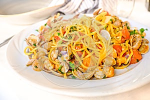 Spaghetti alla chitarra or spaghetti allo scoglio with clams sh