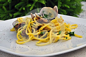 Italian food. Spaghetti alle vongole, pasta with clams photo