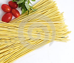 Spaghetti, basil and tomatoes