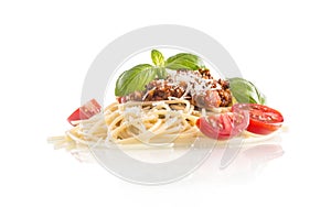 Spaghetti bolognese basil tomatoes and parmesan cheese isolated