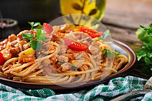 Spaghetti bolognese pasta with tomato sauce, vegetables and minced meat