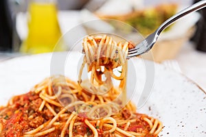 Spaghetti bolognese on a white plate