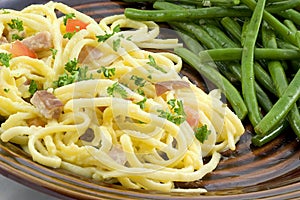 Spaghetti carbonara and beans