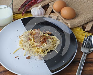 Spaghetti Carbonara,Carbonara pasta, hard parmesan cheese and cream sauce. Traditional italian cuisine