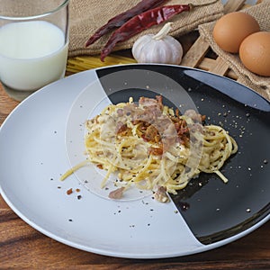 Spaghetti Carbonara,Carbonara pasta, hard parmesan cheese and cream sauce. Traditional italian cuisine