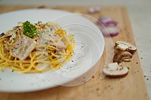 spaghetti carbonara with garnishes ingredients