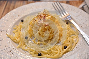 Spaghetti carbonara italian classic dish gourmet food whit eggs chees ham