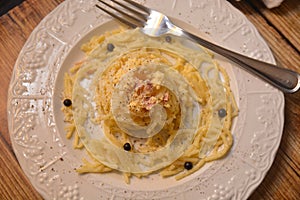 Spaghetti carbonara italian classic dish gourmet food whit eggs chees ham