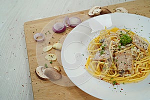 Spaghetti Carbonara presented in a side angle as a menu