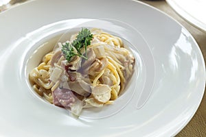 Spaghetti cheese bacon and mushrooms