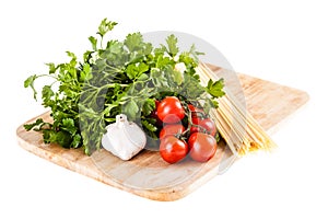 Spaghetti on a cutting board