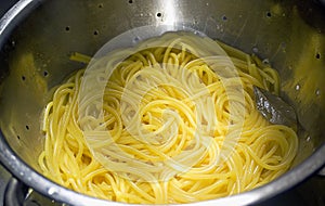 spaghetti in a drainer