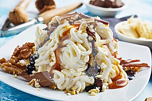 Spaghetti ice cream with fudge caramel topping