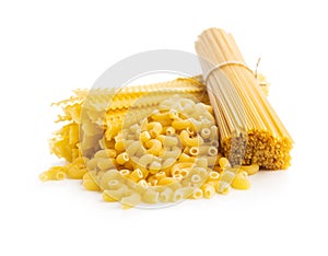 Spaghetti, mafaldine and macaroni pasta. Uncooked italian pasta isolated on white background