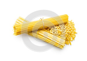 Spaghetti, mafaldine and macaroni pasta. Uncooked italian pasta isolated on white background