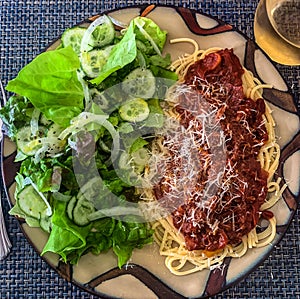 Spaghetti marinara with salad