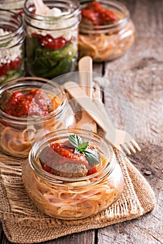 Spaghetti with meatballs served in a jar