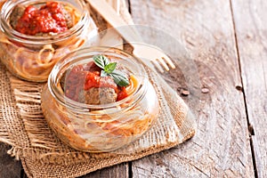 Spaghetti with meatballs served in a jar