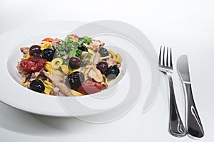Spaghetti with Mediterranean tuna, capers, olives, Sicilian chil