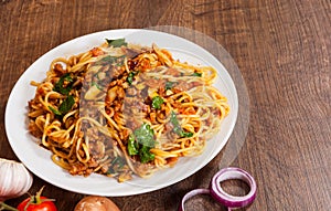 Spaghetti with mushroom, vegetables and minced meat