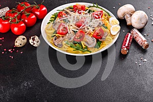 Spaghetti with mushrooms, cheese, spinach, rukkola and cherry tomatoes