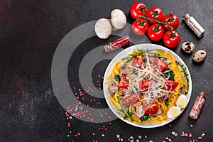 Spaghetti with mushrooms, cheese, spinach, rukkola and cherry tomatoes