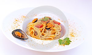 Spaghetti with mussels bottarga fish and cherry tomatoes