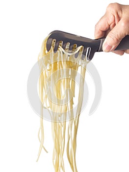 Spaghetti noodles with serving tong