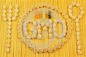 Spaghetti and pasta arrangement. GMO alimentary products concept photo