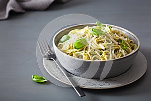 Spaghetti pasta with avocado basil pesto sauce